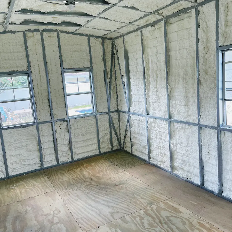 Closed-cell spray foam insulation applied to wall cavities in a residential project in Fuller Heights